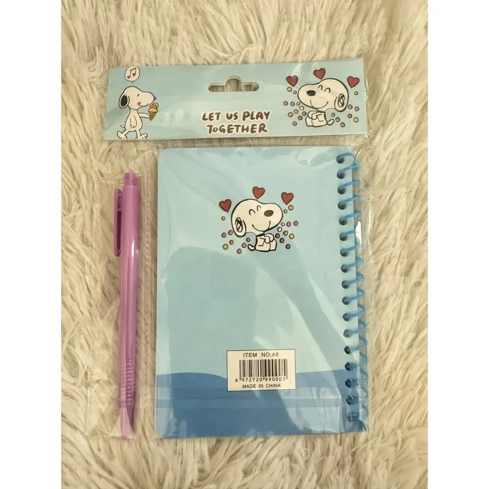 Snoopy blue spiral notebook with designs and a pen size A6